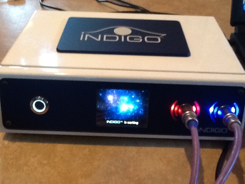 A closeup of the Indigo device with the confirmation of "Indigo is working" displayed