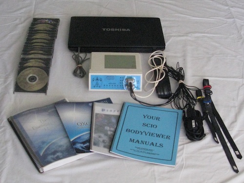 System 17: Quantum Biofeedback SCIO EPFX with a beautiful 17" Toshiba laptop that was NEVER USED, manuals, 4 SCIO EPFX wrist/ankle straps, 1 SCIO EPFX head harness, and numerous training disks